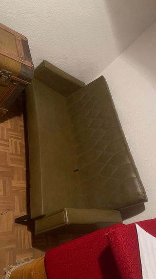 Sofá bajo antiguo de piel