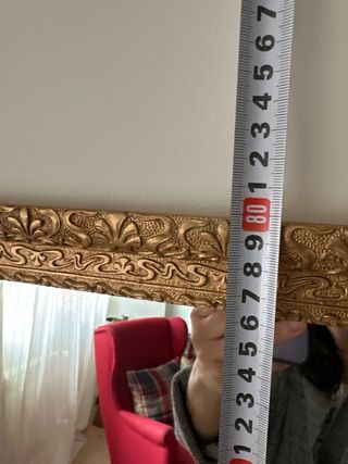 Espejo de madera tallada dorado