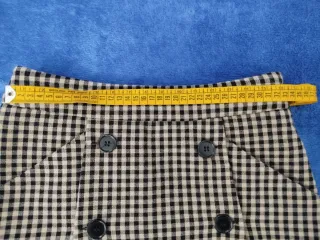 Minigonna a quadretti beige e nero