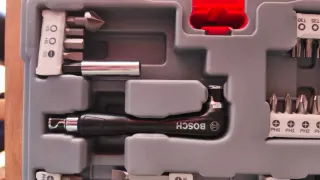 Pack taladro percutor y 50 piezas