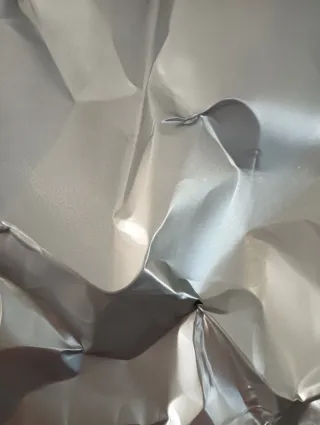 Scultura da parete in alluminio