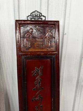 Pareja de paneles tallados