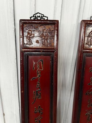 Pareja de paneles tallados