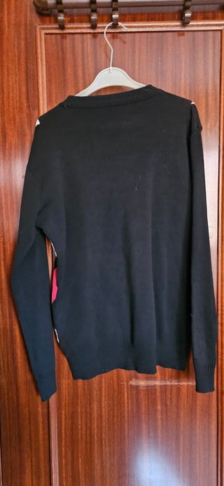 Jersey de rombos negro, rojo y blanco