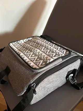 Asiento elevador para niño con arnés