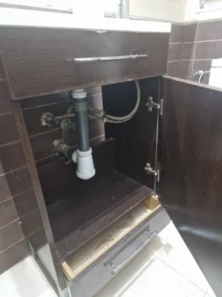 Lavabo con mueble y grifo