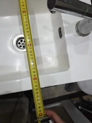 Lavabo con mueble y grifo