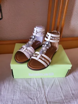 Sandalias gladiador blancas y doradas T36