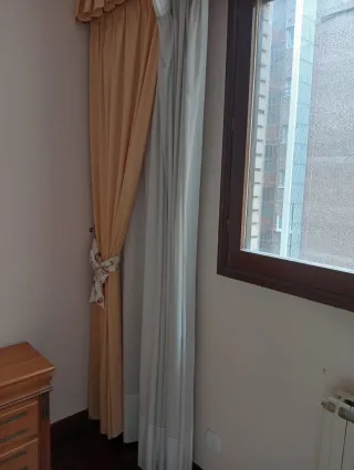 Cortinas beige y grises de tela