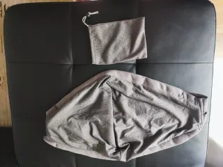 Portabebés gris con bolsa