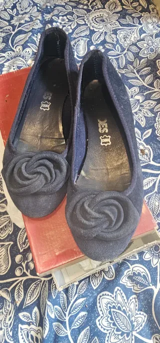 Bailarinas azules con flor