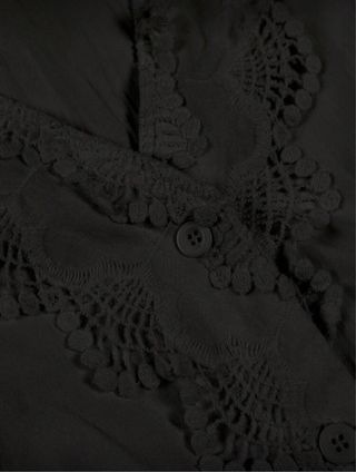 Blusa negra volantes sin estrenar