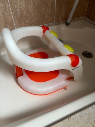 Asiento bebé bañera naranja y blanco jané