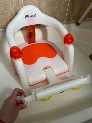 Asiento bebé bañera naranja y blanco jané