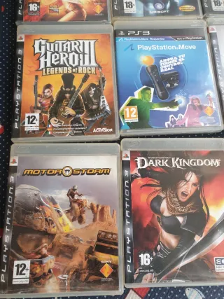 Consola PS3 + Guitarra + Juegos
