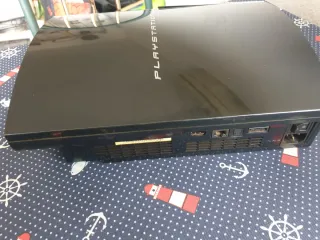 Consola PS3 + Guitarra + Juegos