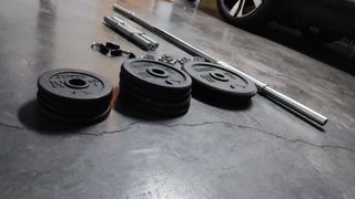 Juego de pesas y barra