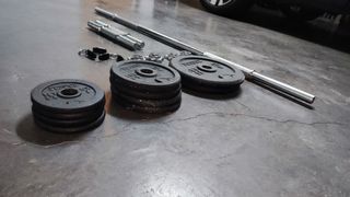 Juego de pesas y barra