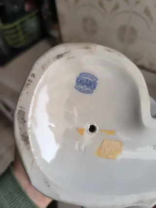 Figura porcelana joven sentada