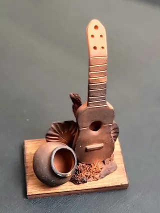Figura terracota guitarra y cántaro