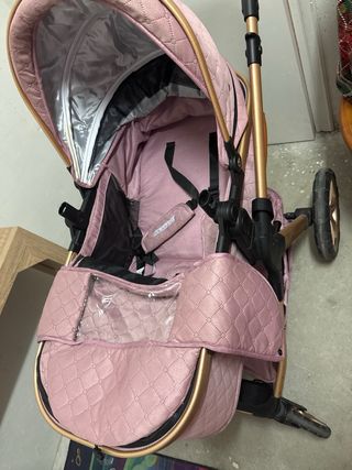 Coche de bebé rosa