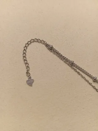 Pulsera plata con trébol y corazón