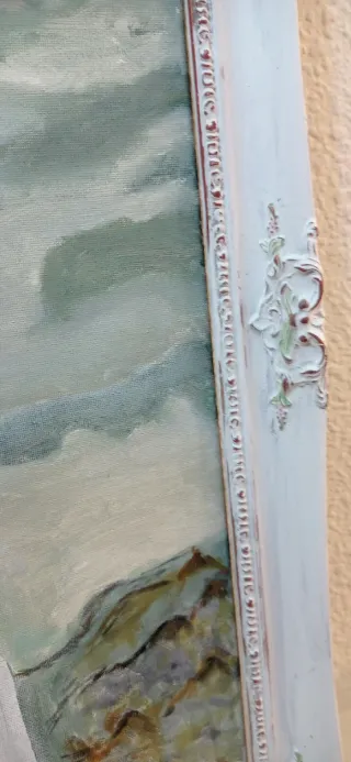 Cuadro al óleo de mujer con paisaje