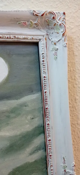 Cuadro al óleo de mujer con paisaje