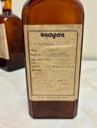 Vecchie bottiglie di benzina Campsa