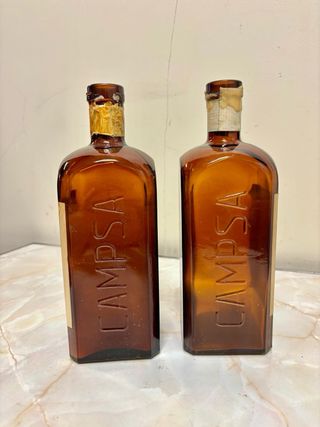 Vecchie bottiglie di benzina Campsa