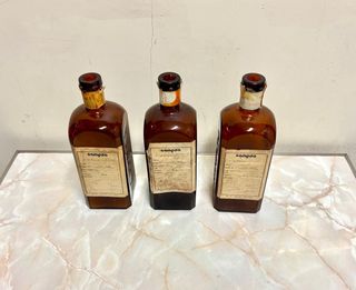 Vecchie bottiglie di benzina Campsa