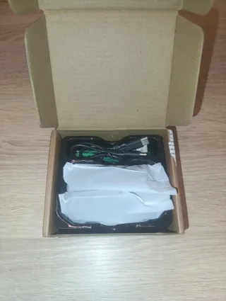 Calienta manos verde con correa