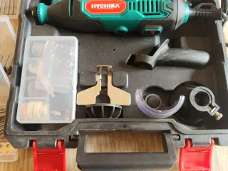 Mini taladro rotatorio Hychika con accesorios