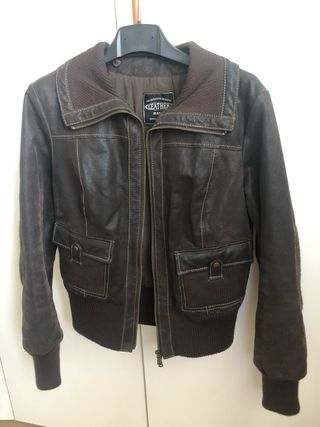 Giubbotto in pelle con pelliccia