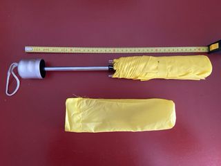 Paraguas plegable amarillo