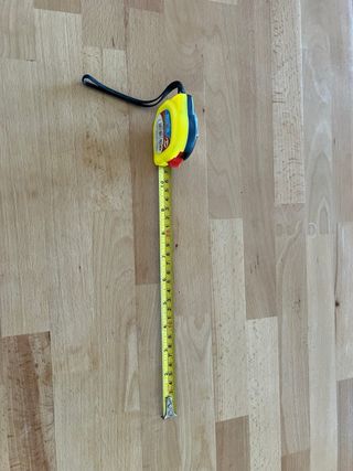 Flexómetro amarillo con cordón