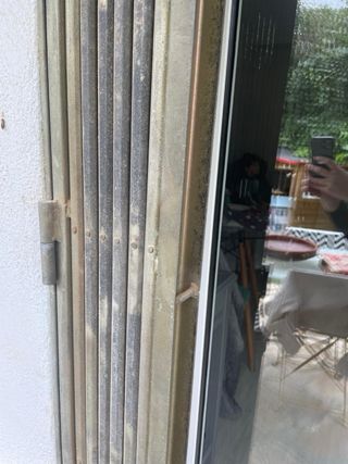 Puerta reja metálica extensible