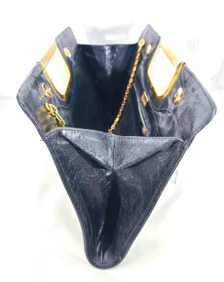Pochette vintage anni 80 nera con dettagli oro