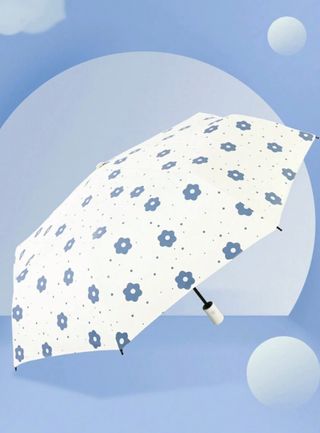 Paraguas blanco con flores azules