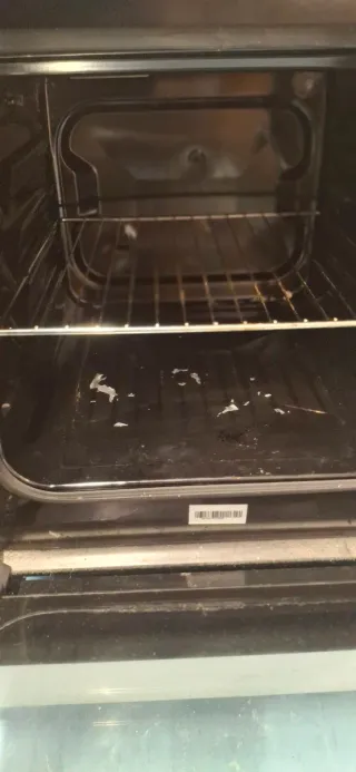 Cocina a gas ciudad con horno eléctrico