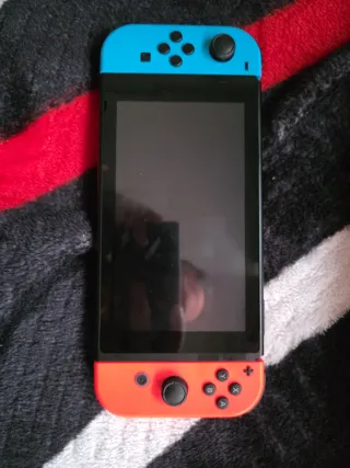 Nintendo Switch Azul/Rojo (CAMBIO POR PS 5 )