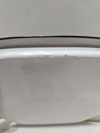 Piccolo vassoio sagomato in metallo smaltato nero