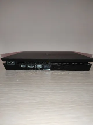 PS4 Slim + 2 Juegos + Mando de la pley