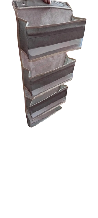 Organizador colgante tela y plástico