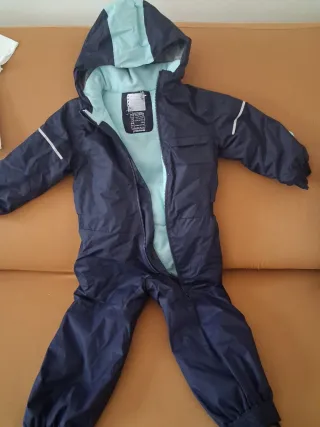 Mono de nieve azul y turquesa 116cm y calcetin