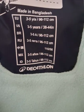 Mono de nieve azul y turquesa 116cm y calcetin