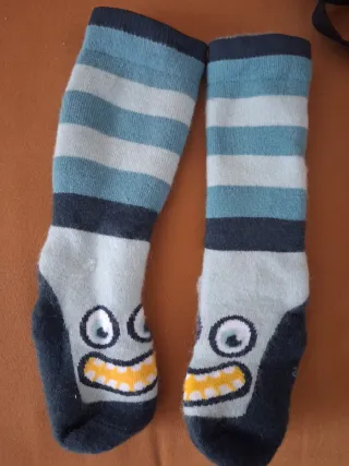 Mono de nieve azul y turquesa 116cm y calcetin