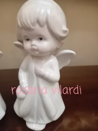 Cuore con mani ceramica e luce