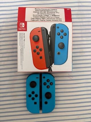 Nintendo Switch con 4 joy cins y funda + dos juego