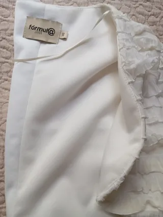 Chaquetilla blanca de fiesta.